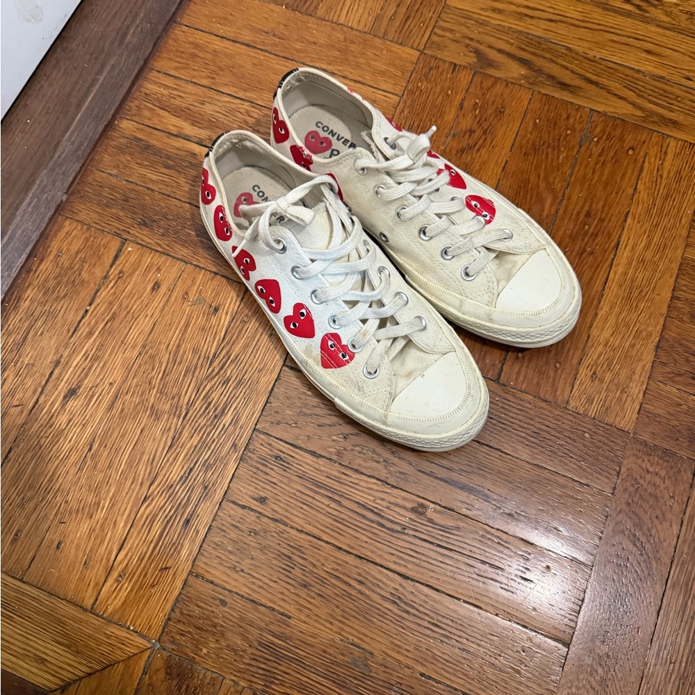 Converse Chuck Taylor Cream Canvas Sneakers with Red Logo Accents